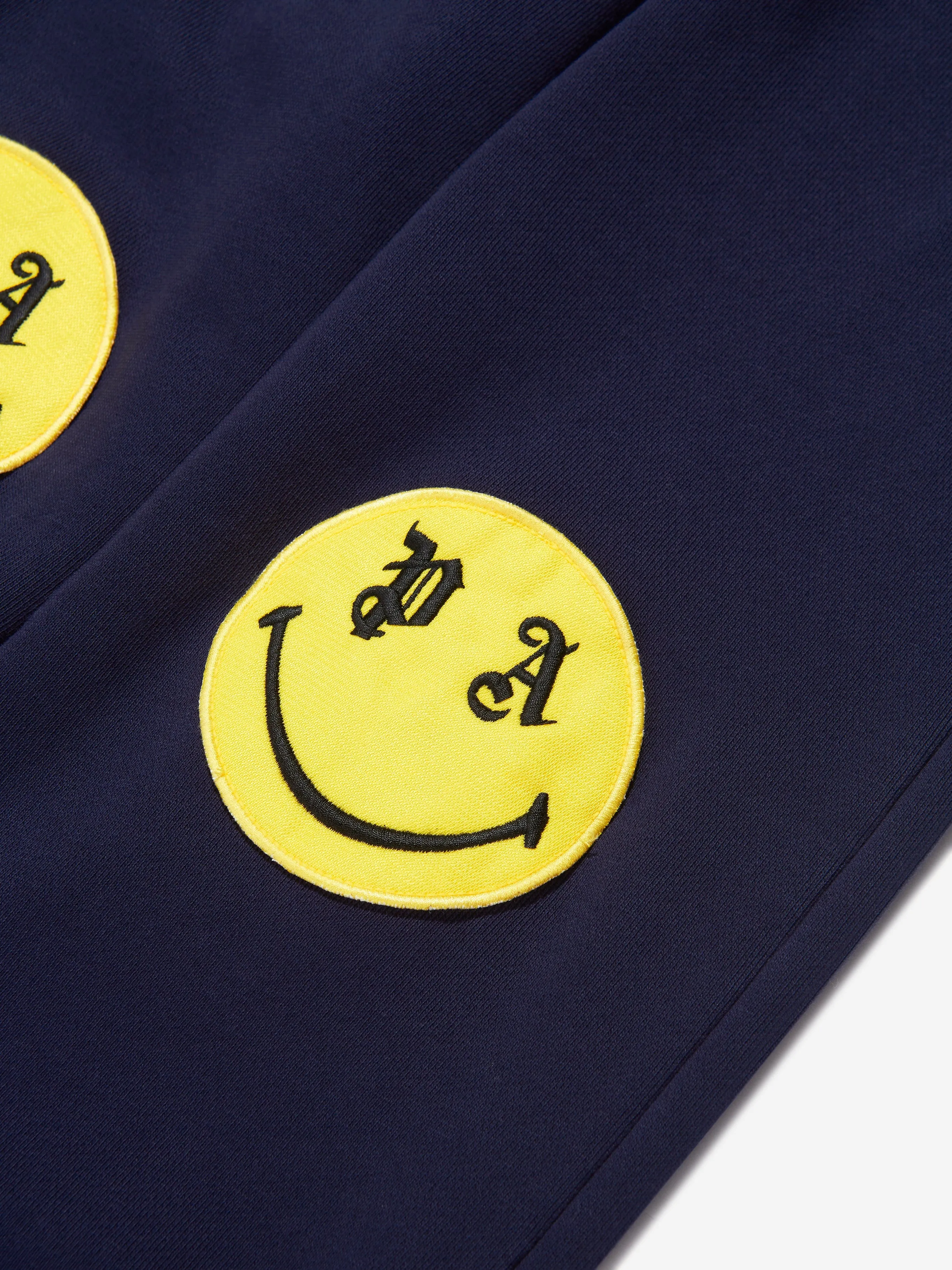 Palm Angels Boys PA Smiley Joggers in Navy