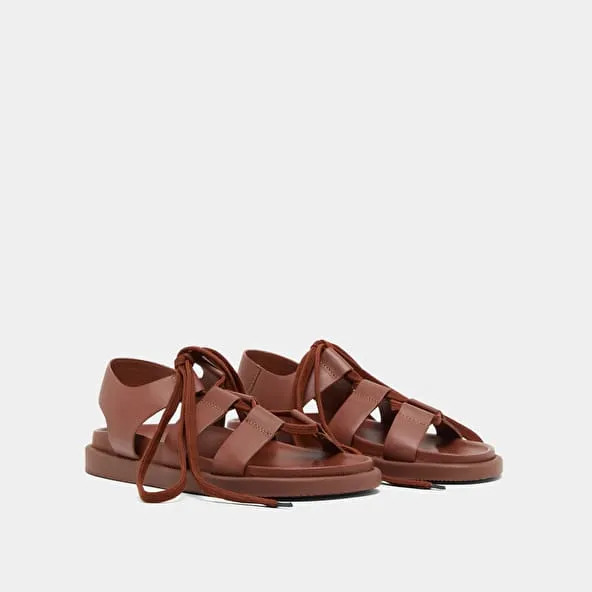 Sandals with multiple straps and laces in cognac leather